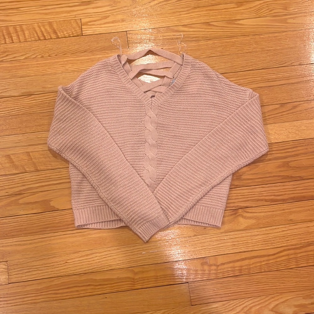 Brand new peach sweater women’s size medium.